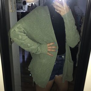 light green knit cardigan w/ pockets & arm detail